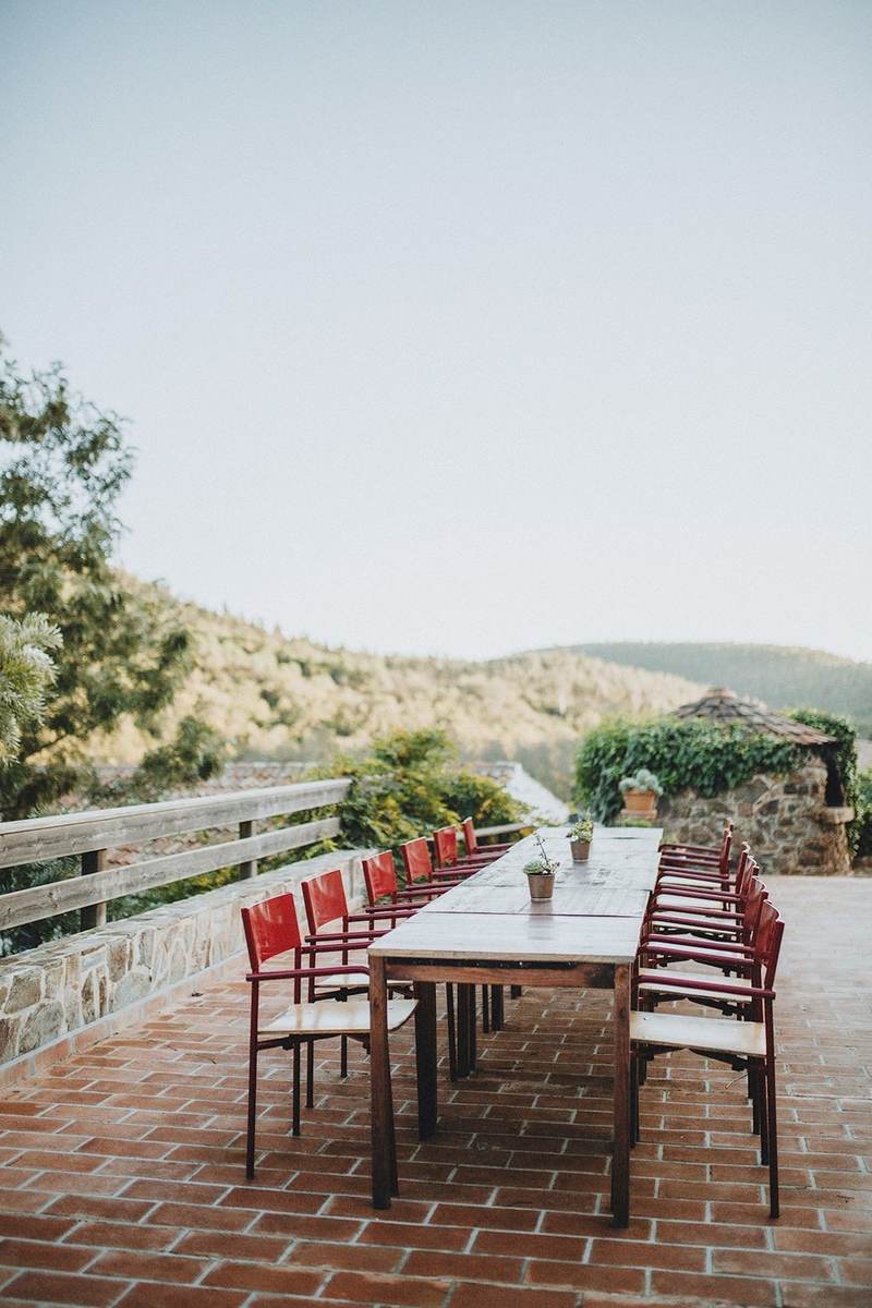 The long table on the terrace looking over the hills