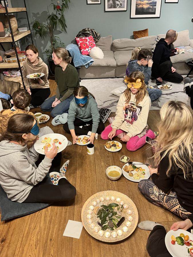 A seated circle during a family retreat